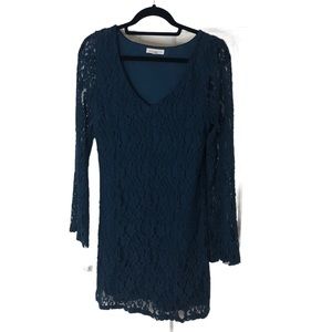 Socialite size (M) long bell sleeve lace mini dress in navy blue